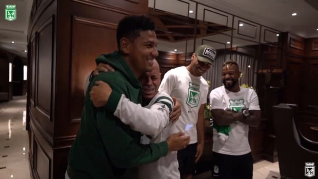 Atlético Nacional players surprise a passionate fan